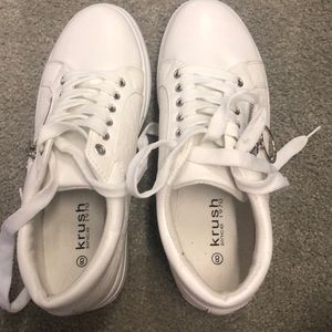 Platform white sneakers with snake skin detail